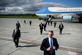 File: US president Donald Trump gestures as he walks on the tarmac at Elmendorf Air Force Base in Anchorage in Alaska